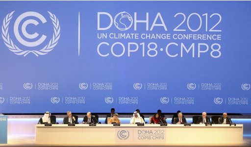 FILE - This Nov. 26, 2012 file photo shows organizers on stage at the opening ceremony of the 18th United Nations climate change conference in Doha, Qatar. The amount of heat-trapping pollution the world spewed rose again last year by 3 percent. So scientists say it's now unlikely global warming can be limited by more than a couple degrees, which is an international goal. (AP Photo/Osama Faisal, File)