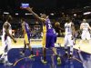 Los Angeles Lakers shooting guard Kobe Bryant reacts after a play against the Charlotte Bobcats during the second half of their NBA basketball game in Charlotte