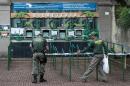 National Institute of Environment personnel close Rio de Janeiro's Zoo on January 14, 2016 while staff carry out improvements to revitalize the park