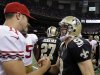 New Orleans Saints quarterback Drew Brees (9) shakes hands with San Francisco 49ers quarterback Alex Smith (11) after an NFL football game in New Orleans, Sunday, Nov. 25, 2012. The 49ers won 31-21. (AP Photo/Bill Haber)
