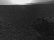 This full-resolution version of one of the first images taken by a rear-left Hazard-Avoidance camera on NASA's Curiosity rover, was released on Aug. 6, 2012.The image was originally taken through the "fisheye" wide-angle lens, but has been "lin