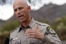 Pinal County Sheriff Paul Babeu speaks during a news conference near the Superstition Mountains where rescue workers searched for victims of a plane crashed in Apache Junction