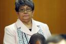 FILE - In this Friday, May 3, 2013, file photo, former Atlanta Public Schools Superintendent Beverly Hall stands as her attorney presents a motion at the Fulton County Superior Court hearing for several dozen Atlanta Public Schools educators facing charges alleging a conspiracy of cheating on the CRCT standardized tests in Atlanta. Hall, the former superintendent of Atlanta Public Schools charged in what prosecutors had called a broad conspiracy to cheat on state exams, has died, her attorney said Monday, March 2, 2015. (AP Photo/David Tulis, File)