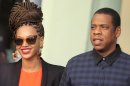 File photo of U.S. singer Beyonce and her husband rapper Jay-Z walking as they leave their Hotel in Havana