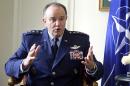 NATO Supreme Allied Commander Europe, U.S. Air Force General Philip Breedlove gestures during an interview with the Associated Press in Paris, Wednesday April 9, 2014, as he talks about his mission to formulate a plan to help protect and reassure NATO members nearest Russia. NATO's top military commander in Europe, Breedlove is tasked with drafting countermoves to the Russian military threat against Ukraine. (AP Photo/Remy de la Mauviniere)