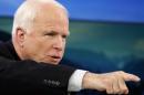 U.S. Senator McCain attends a session of World Economic Forum in Davos
