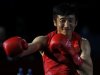 China's Zou Shiming arrives for his Men's Light Fly (49kg) gold medal boxing match against Thailand's Kaeo Pongprayoon at the London Olympics
