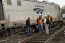 NTSB photo of NTSB officials on the scene of the Amtrak Train #188 Derailment in Philadelphia Pennsylvania