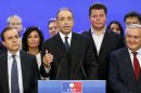 French politician Cope claims victory in a close election vote to head the UMP political party during a news conference at their headquarters in Paris