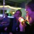 Rachel Schaefer of Denver smokes marijuana on the official opening night of Club 64, a marijuana-specific social club, where a New Year's Eve party was held, in Denver, Monday Dec. 31, 2012. On Election Day, Nov. 6, 2012, a plurality of Coloradans voted in favor of Proposition 64 to legalize recreational marijuana. (AP Photo/Brennan Linsley)