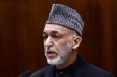 Afghanistan's President Karzai speaks during opening ceremony of the third year of the Afghanistan parliament in Kabul