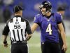 Side judge Jimmy DeBell (58) shakes hands with Baltimore Ravens punter Sam Koch (4) before an NFL football game against the Cleveland Browns in Baltimore, Thursday, Sept. 27, 2012. (AP Photo/Nick Wass)