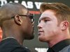 Floyd Mayweather, left, poses in a face-off with Saul "Canelo" Alvarez during a boxing news conference on Monday, June 24, 2013, at New York's Times Square. MayWeather and Alvarez kicked-off an 11-city promotional, making their fight in Las Vegas in September official. The undefeated fighters announced on Twitter last month that they would face each other at the MGM Grand on Sept. 14. (AP Photo/Bebeto Matthews)