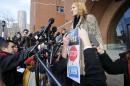 Elena Teyer speaks to reporters following a pre-trial conference for Boston Marathon bombing suspect Dzhokhar Tsarnaev at the federal courthouse in Boston