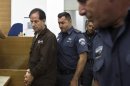 Iranian-Belgian citizen Mansouri arrives at a courtroom at the magistrate's court in Petah Tikva