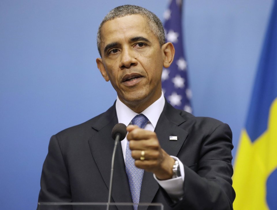 President Barack Obama gestures during his joint news conference with Swedish Prime Minister Fredrik Reinfeldt, Wednesday, Sept. 4, 2013, at the Rosenbad Building in Stockholm, Sweden. The president said international community and Congress credibility on the line on response to Syria . (AP Photo/Pablo Martinez Monsivais)