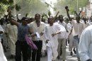 Sudanese protesters chant slogans during a protest in Khartoum, Sudan, Friday, Sept. 14, 2012, as part of widespread anger across the Muslim world about a film ridiculing Islam's Prophet Muhammad. Germany's Foreign Minister says the country's embassy in the Sudanese capital of Khartoum has been stormed by protesters and set partially on fire. Minister Guido Westerwelle told reporters that the demonstrators are apparently protesting against an anti-Islam film produced in the United States that denigrates the Prophet Muhammad.(AP Photo/Abd Raouf)