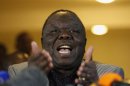 Zimbabwe's Prime Minister Tsvangirai gestures during a media briefing in Harare