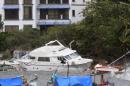 Boats damaged by winds and waves caused by hurricane Carlos are seen at a marina in Acapulco