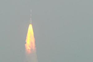 A rocket carrying India's Mars Orbiter probe lifts …