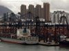 Highrise residential buildings are seen behind container terminals in Hong Kong