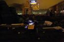 Anti-government protesters reads magazine in central Kiev