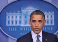 President Barack Obama wiped away tears and struggled to compose himself Friday as he mourned those killed in a school shooting in Connecticut. Twenty small children and six teachers were massacred when a young gunman walked into the school armed with sophisticated handguns