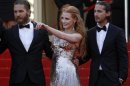Cast members Hardy Labeouf and Chastain arrive on the red carpet for the screening of the film Lawless at the 65th Cannes Film Festival
