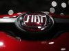 A company logo is seen on a Fiat car displayed on media day at the Paris Mondial de l'Automobile