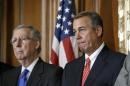 In this photo taken Feb. 10, 2015, House Speaker John Boehner of Ohio, joined by Senate Majority Leader Mitch McConnell of Ky. are seen on Capitol Hill in Washington. Boehner says Senate Democrats should "get off their ass" and pass a bill to fund the Homeland Security Department and restrict President Barack Obama's executive moves on immigration. His comments Wednesday underscored a worsening stalemate on Capitol Hill with funding for the Homeland Security Department set to expire Feb. 27. A day earlier, McConnell declared the Senate "stuck" on the issue and said the next move was in the House's court. (AP Photo/J. Scott Applewhite)