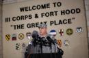 Lt. Gen. Mark Milley, commanding general of III Corps and Fort Hood, speaks with the media outside of an entrance to the Fort Hood military base following a shooting that occurred inside, Wednesday, April 2, 2014, in Fort Hood, Texas. Four people were killed, including the gunman, and 16 were wounded in the attack, authorities said. (AP Photo/Tamir Kalifa)