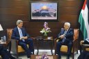 U.S. Secretary of State Kerry meets with Palestinian President Abbas at the Mukataa compound, in the West Bank city of Ramallah