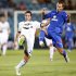 Real Madrid's Higuain and Getafe's Alexis fight for the ball during their Spanish first division soccer match in Getafe
