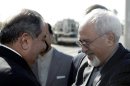 Iraqi FM Hoshyar Zebari (left) welcomes his Iranian counterpart Mohammad Javad Zarif in Baghdad, on September 8, 2013
