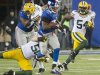 New York Giants' Brown breaks past Green Bay Packers' Hawk for gain in NFL game in East Rutherford