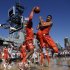 Syracuse forward James Southerland, left, saves a ball from going out of bounds as Michael Carter-Williams, right, jumps out of the way while playing San Diego State during the first half of an NCAA college basketball game on the deck of the USS Midway, Sunday, Nov. 11, 2012, in San Diego. (AP Photo/Gregory Bull)