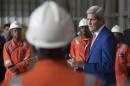 US Secretary of State John Kerry (R) speaks following a tour of the General Electric (GE) Sonils compound in Luanda, Angola, on May 4, 2014