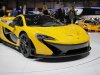 People look at the new McLaren P1 during the 83rd Geneva International Motor Show, Switzerland, Monday, March 4, 2013. The Motor Show will open its gates to the public from March 7 to 17.  (AP Photo/Laurent Cipriani)