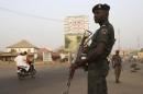 Policemen stand guard near Independent National Electoral Commission in Kano