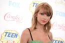 FILE - This Aug. 10, 2014 file photo shows Taylor Swift at the Teen Choice Awards at the Shrine Auditorium in Los Angeles. Swift says she's releasing her first full-length pop album on Oct. 27. The 24-year-old revealed in a livestream via Yahoo! on Monday , Aug, 18, that 