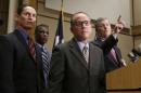 Dallas Mayor Mike Rawlings, right, takes a question as Dr. Dan Varga, chief clinical officer at Texas Health Presbyterian Hospital, second from right, Dallas County Judge Clay Jenkins, left, and Zachary Thompson, director of Dallas County Health and Human Services, look on during a news conference, Wednesday, Oct. 15, 2014, in Dallas. A second health care worker has tested positive for Ebola. (AP Photo/LM Otero)