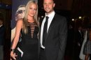 Oscar Pistorius and his girlfriend Reeva Steenkamp pose for a picture in Johannesburg