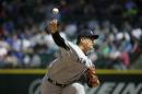 New York Yankees starting pitcher Masahiro Tanaka throws against the Seattle Mariners in the sixth inning of a baseball game, Wednesday, June 3, 2015, in Seattle. (AP Photo/Ted S. Warren)