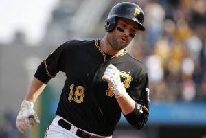 Walker, Worley lead surging Pirates past Reds 3-2