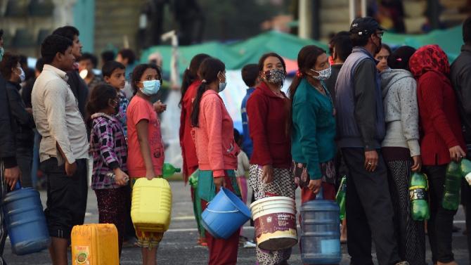 Nepal quake toll tops 5000 as aid reaches area Nepal-quake-toll.