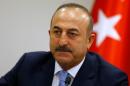 Turkey's Foreign Minister Mevlut Cavusoglu addresses the media in Ankara