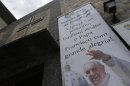 A banner promoting World Youth Day is seen at the Chapel of Sao Jeronimo, where Pope Francis is expected to visit during his upcoming trip to Varginha slum in Manguinhos slums complex in Rio de Janeiro
