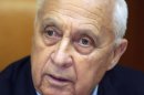 FILE - In this Jan. 24, 2005 file photo, Israeli Prime Minister Ariel Sharon appears at the start of a meeting at his office, in Jerusalem. Seven years after a massive stroke removed him from office and left him in a vegetative state, comatose former Israeli Prime Minister Ariel Sharon is able to process information and has exhibited "robust activity" in his brain, one of the half-dozen doctors who recently tested him said Monday. (AP Photo/Brennan Linsley, File)