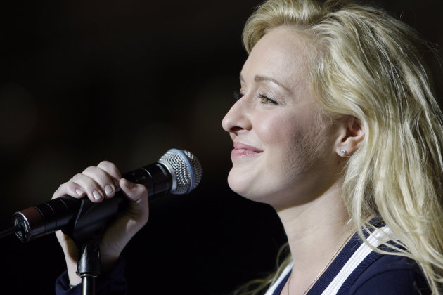 FILE - In this undated file photo, country singer Mindy McCready performs in Nashville, Tenn. A missing persons report has been filed for McCready and her 5-year-old son Zander. The Department of Children and Families says the report was filed with Cape Coral Police Tuesday night after McCready took Zander from McCready's father's home. McCready doesn't have custody of her son ? her mother does ? and was allowed to visit the boy at her father's home. (AP Photo/Mark Humphrey, file)