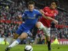 Manchester United's Shinji Kagawa challenges Chelsea's Azpilicueta during their English FA Cup quarter-final soccer match at Old Trafford in Manchester
